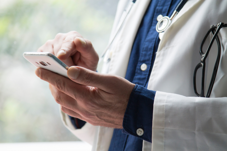 Doctor using a smartphone for a Tele-depth Interview