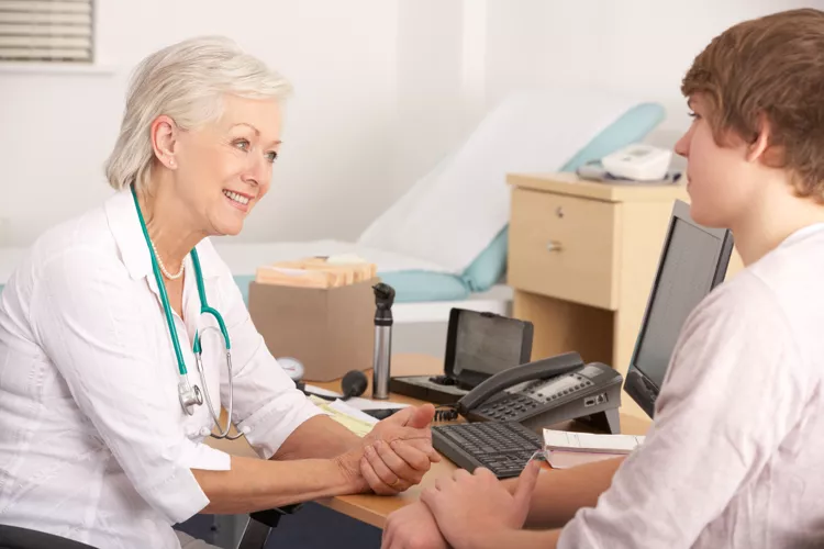 A doctor with a patient to represent "A Market Researcher’s Guide to the NHS"